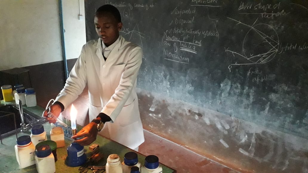 this is a picture of me preparing for a chemistry lab class